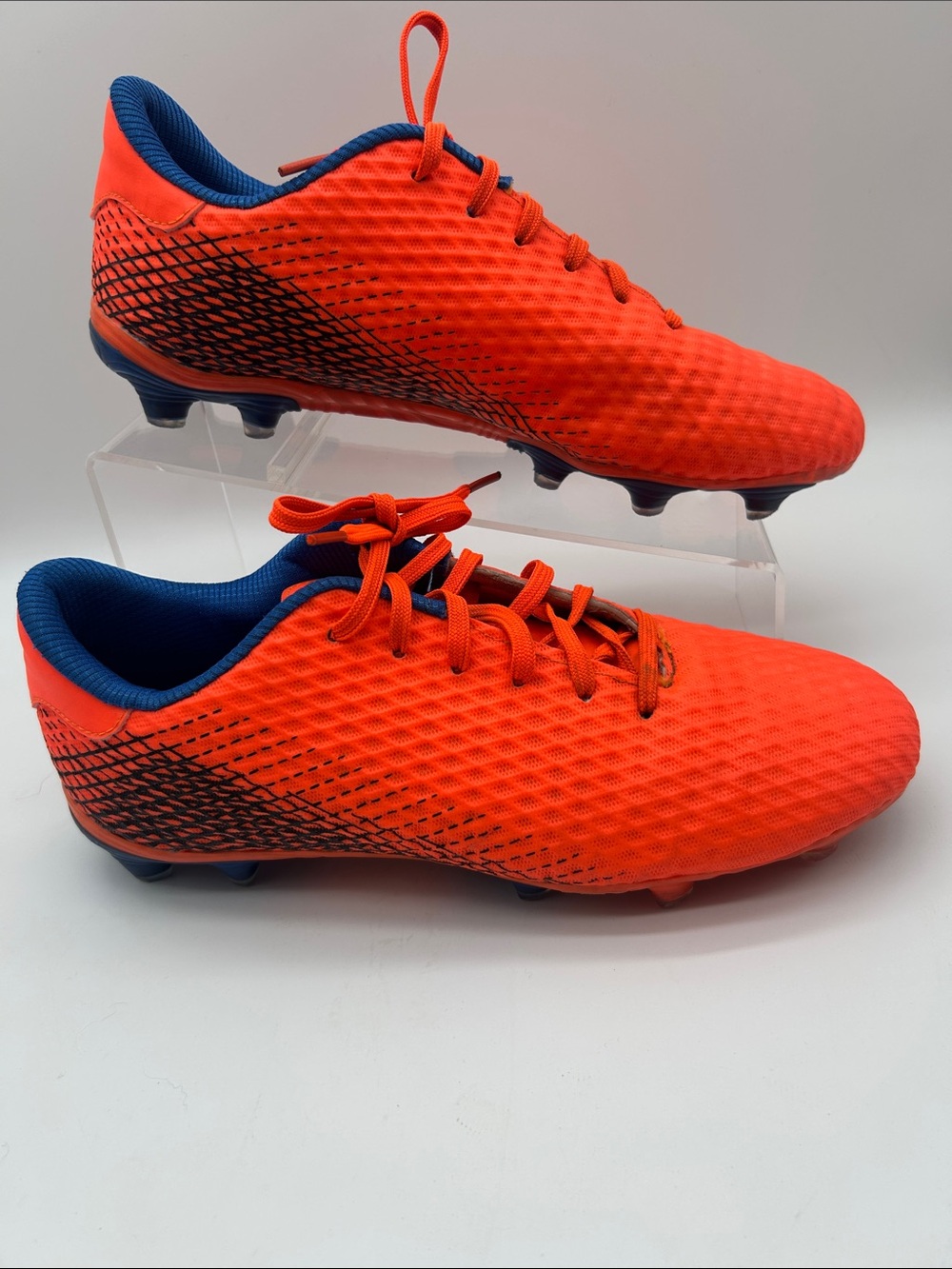 Bright Orange Soccer Cleats with Navy Accents